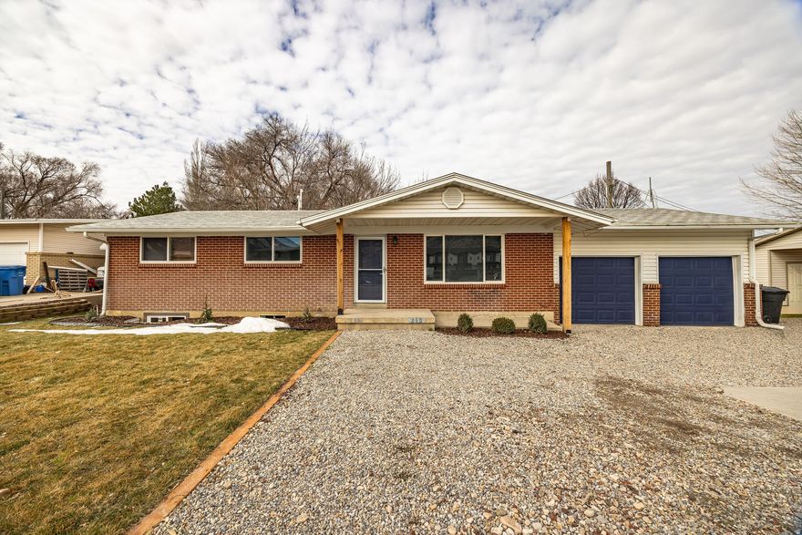 The opportunity to own this incredible property won't last long! This beautifully updated home features 5 bedrooms, 2 bathrooms, and sits on a spacious .52-acre lot. Thoughtfully renovated throughout, it offers the perfect blend of modern updates and room to make it your own. The expansive backyard is a true highlight-complete with multiple outbuildings, abundant fruit trees, thriving grapevines, and endless possibilities for gardening, hobbies, or additional storage. With so much open space, it's the perfect setting for kids to run, play, and create lasting memories. Secondary water through Hyrum City makes maintaining your own private fruit oasis easy and affordable. Don't miss out-call today to schedule your private showing!  Buyer to verify all information.