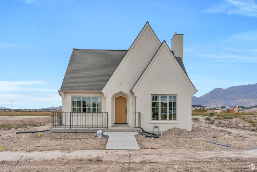 Welcome to Holdaway Fields  Vineyard's Newest 55+ Community! Discover thoughtfully designed, low-maintenance living in the heart of Vineyard. A designated portion of this community is reserved exclusively for adults 55+, offering an ideal blend of comfort, convenience, and connection. Goodboro Homes showcases timeless Utah architecture with classic cottage designs, welcoming front porches, and beautifully landscaped streetscapes. This stunning tudor style single-level home features a spacious, light-filled open floor plan with a large gourmet kitchen and high-end finishes throughout. The expansive primary suite offers both his-and-hers walk-in closets and dual vanities for ultimate comfort and luxury. The HOA takes care of front yard landscaping, snow removal on driveways, sidewalks, and roads, so you can focus on what matters most. Our community will feature resort style amenities including a clubhouse with a fitness center, gathering space, outdoor pool, scenic walking trails by the lake, and a pickleball court. You'll love the convenient location-just minutes from the Utah Lake trail system, neighboring Sleepy Ridge Golf Course, Megaplex Theatres, Topgolf, shopping, dining, and more! Ask about our special incentives to finish the basement for additional bedrooms and/or living space, as well as exclusive offers with our preferred lender.Call or message us today to schedule a private tour! Don't forget to stop by the beautifully staged model home next door-open Mon, Wed - Sat from 126 PM. Tues by appt only. *Photos are of a similar floorplan and may not be exact.