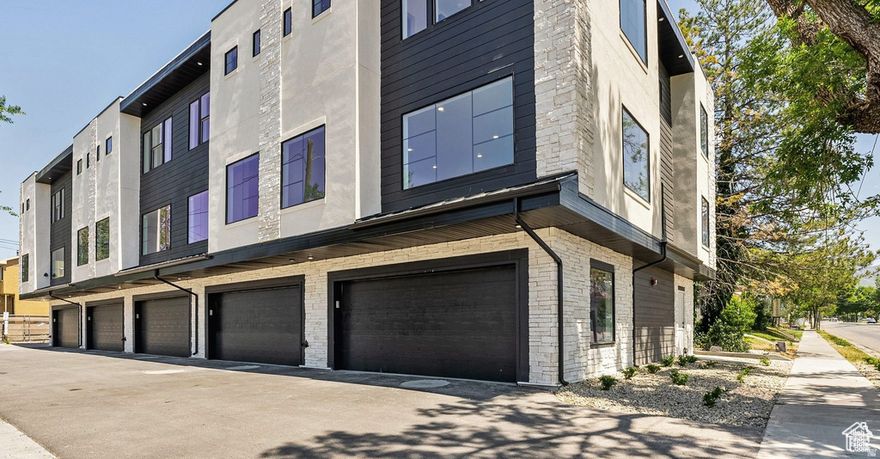 END UNIT!  Located in an area of Sugarhouse that is becoming quickly revitalized. Land costs, as well as construction costs in this area are guaranteed to drive your equity higher. Located in the only zone in SLC that allows Short Term Rentals. Floor plans are conducive to a street level office with outside entrance. Large garages allow for oversized trucks and SUVs. Super efficient HVAC system, halogen lighting and extra insulation. Fans in all bedrooms Upgraded stainless appliances. Designer finishes throughout, from cabinets, flooring and tile. Large, black finished, windows throughout. Extra storage closets throughout. Fire sprinkler system, for lower insurance and short term rental requirement. Upgraded stainless appliances. Designer finishes throughout, including cabinets, flooring and tile. Large, black finished, windows throughout. Extra storage closets throughout. Fire sprinkler system, for lower insurance and short term rental requirement.