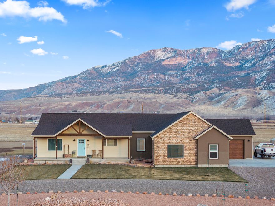 Income-Producing Home on 3 Acres with Fully Finished Basement Apartment and INCREDIBLE VIEWS!  This exceptional property offers a rare combination of space, flexibility, and proven income-all situated on approximately 3 acres of usable land. Whether you're looking for a primary residence with built-in cash flow or a lifestyle property that pays for itself, this one check boxes most homes simply can't.  The main level of the home features a well-designed, open-concept layout with comfortable living spaces, quality finishes, and room to spread out-both inside and out. But the real differentiator is the fully finished basement living space with exterior AND interior entrance that is currently operated as a short-term rental generating over $20,000 per year in gross income.  The basement apartment is fully functional and turnkey, offering its own living area, kitchen setup, bedroom(s), and bathroom-making it ideal for:  Short-term or mid-term rental income  Long-term tenant  Multigenerational living  Guest quarters or private home office  Outside, the 3-acre lot provides privacy, elbow room, and endless possibilities-space for animals, a shop, RV parking, future outbuildings, or simply enjoying wide-open views and breathing room you can't find in typical subdivisions.  This property stands out as:  Owner-occupied + income-producing  Fully finished basement   Proven rental history  Large acreage  Flexible use potential  Homes like this don't come along often-especially ones that already have documented income in place. Live in it, rent part of it, or optimize both. This property gives you options, leverage, and long-term upside.