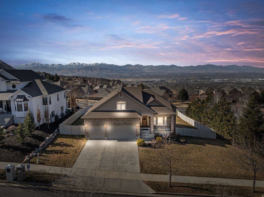 Perched in the coveted Corner Canyon neighborhood, this stunning Draper home showcases sweeping 360-degree views with just under 5,000 sq ft of beautifully designed living space. The open-concept main level is ideal for everyday living and entertaining, featuring a rare main-floor primary suite and spacious gathering areas filled with natural light. The fully finished walkout basement includes a kitchenette and several large flex spaces that can be used as a theater room, second living area, or multiple bedrooms-perfect for multigenerational living, guests, or entertaining. Step outside to enjoy a very large backyard with room to play, relax, and take in the incredible mountain and valley scenery. Enjoy direct access to the Corner Canyon Trail System right outside your door-an unbeatable location for hiking, mountain biking, and year-round outdoor adventure. Located within the highly desirable Canyon School District and conveniently close to the Draper Temple, this home offers the perfect blend of luxury, location, and lifestyle.    Square footage figures are provided as a courtesy estimate only and were obtained from prior listing.  Buyer is advised to obtain an independent measurement.