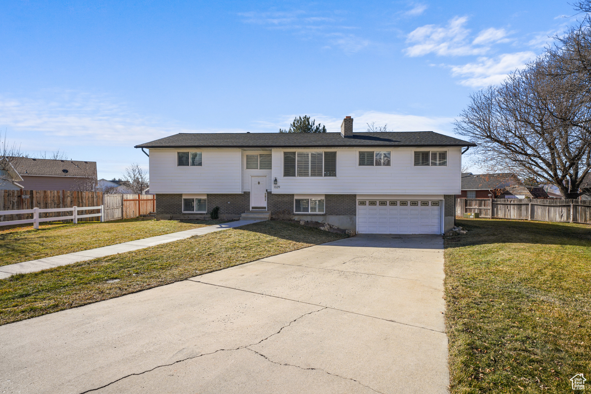 This home is tucked away in a quiet cul-de-sac, offering a peaceful setting and nice views of Mt. Timpanogos. It features a spacious backyard, new roof and siding, newer windows, and plantation shutters throughout. The interior has been updated with granite countertops and updated cabinets. A natural stone fireplace and wood-burning stove add to the home's charm.