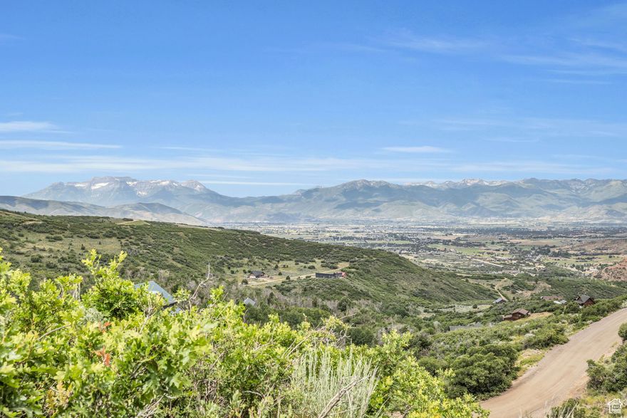 1/7 update: Septic feasibility confirmed and four bedroom design completed.  Ready to build.  Imagine building your dream mountain home on this easily accessible, gently sloped uphill building lot with far reaching views of Mt Timpanogos. This homesite backs up to hundreds of acres of open space and can be combined with the adjacent lot to create an extra private 2.6 acre homesite. Water, power, and high speed internet are available on this parcel. Percolation test and topo survey have been completed. This lot is located within Timberlakes, a private gated neighborhood with year round road access, several common areas with ponds and hiking trails, and access to spectacular snowmobiling in the High Uinta Mountains.