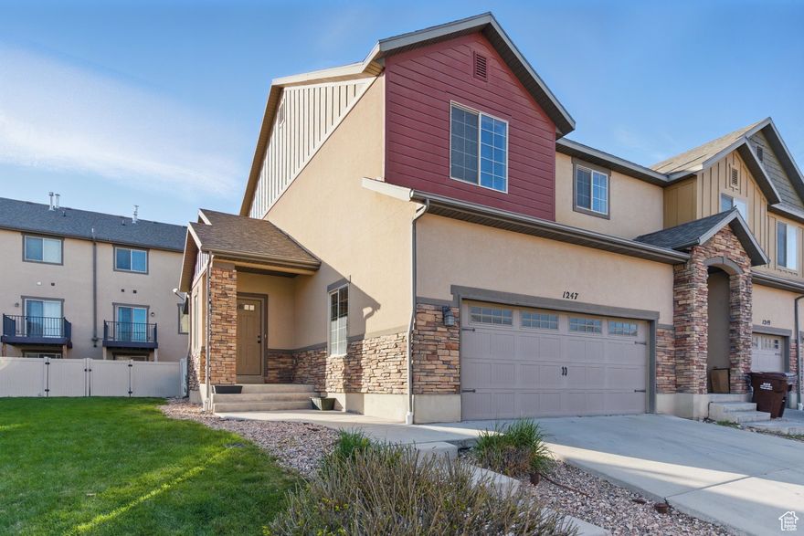 Welcome to this beautiful end-unit townhome in the heart of Saratoga Springs! Thoughtfully designed with upgraded finishes throughout, this home offers a perfect blend of comfort and convenience. Step outside to your own fenced back patio-ideal for summer BBQs, evening relaxation, or hosting friends. The spacious basement family room includes a handy kitchenette and a full bathroom, making it a great spot for movie nights, game days, or even a private guest retreat. Just minutes from Costco, Redwood Road, Silicon Slopes, and Thanksgiving Point, you'll love the easy access to shopping, dining, and major commuter routes. Don't miss your chance to live in one of the fastest-growing areas around!