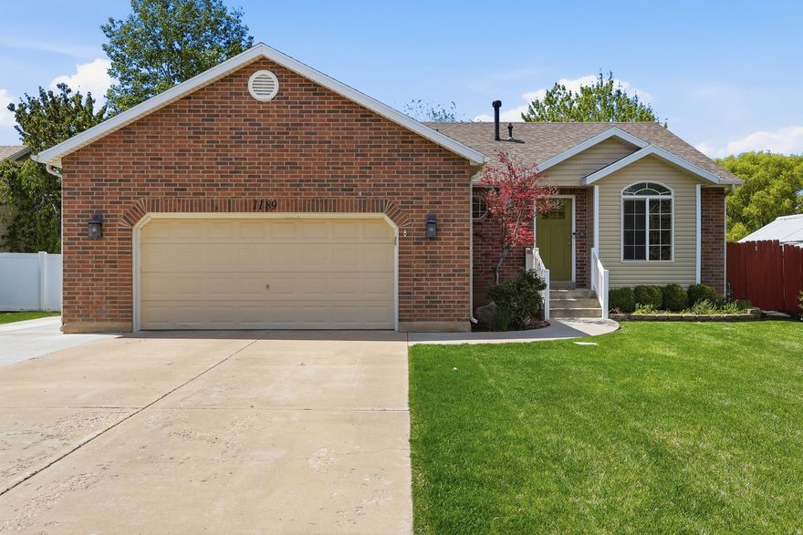 This well-maintained Clinton home checks all the boxes - updated, efficient, and move-in ready. Spanning approximately 2,300 sq ft across a fully finished basement, the layout gives every member of the household room to spread out. Vaulted ceilings add volume to the main living areas, and the primary suite comes with an ensuite bath for the privacy and comfort buyers expect. Fresh interior paint throughout gives the home a clean, bright feel, and new flooring in the kitchen and living room adds a polished finish where it counts most. The kitchen includes the microwave, range, and dishwasher. The interior refrigerator (kitchen) is negotiable with the sale. The 2-car attached garage and RV parking cover all your storage and vehicle needs without compromise. The backyard is a standout - fully fenced and beautifully landscaped with mature trees, fruit trees, and shrubs, plus a garden and an in-ground trampoline. It's the kind of outdoor space that actually gets used. Major systems have been methodically upgraded: brand new AC (2026), full roof replacement with 30-year architectural shingles (2022), new water heater and soft water system (2021), a 96% efficient furnace (2019), and owned solar (2019) keeping utility costs low. Square footage is based on previous listings and is provided as a courtesy to buyer. Buyer to verify all information