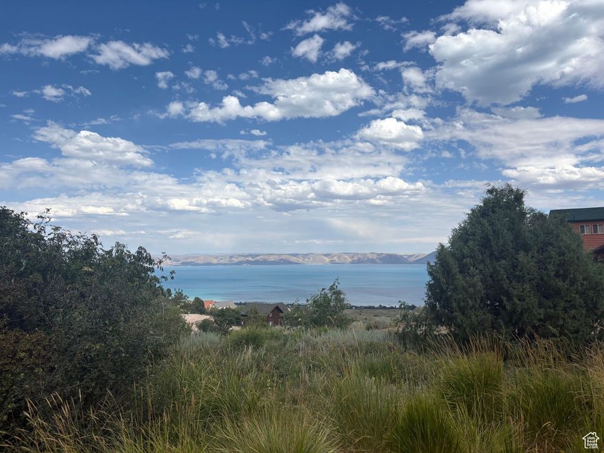 Excellent building lot in Bear Lake West with lake and mountain views.  Close to Fish Haven Canyon trail head for ATV/UTV, snowmobiling, hiking, snowshoeing, mountain biking.  Bear Lake State Park Marina 5 min; Beaver Mountain Ski Resort 20 min. Great amenities with Cooper's Restaurant, Bear Lake Golf Course, tennis/pickleball courts, heated swimming pool (seasonal), hot tub (year round) and BEACH ACCESS! Power, water, sewer available. HOA does not allow nightly rentals.