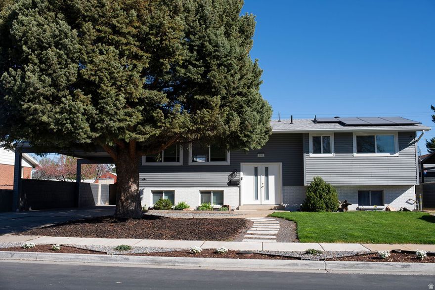 OPEN HOUSE!! 3/28 from 12-3. No showings before open house. Beautifully remodeled home with a fully equipped mother-in-law apartment-perfect for multi-generational living, rental income, guest space, or even a duplex. The apartment has its own entrance, kitchen, and living area, while the main home offers a bright, open layout with plenty of natural light for comfortable everyday living. Separate laundry hookups upstairs and downstairs add convenience, and a new roof plus a fully paid-off solar system installed in the last two years provide energy savings and peace of mind. A massive 25x25 garage features a 220-volt subpanel and charging, ideal for electric vehicles, storage, or a workshop. Located in the heart of Salt Lake City with easy access to schools, shopping, dining, and outdoor recreation. Rare opportunity to own a move-in ready, fully remodeled home with incredible functionality, income potential