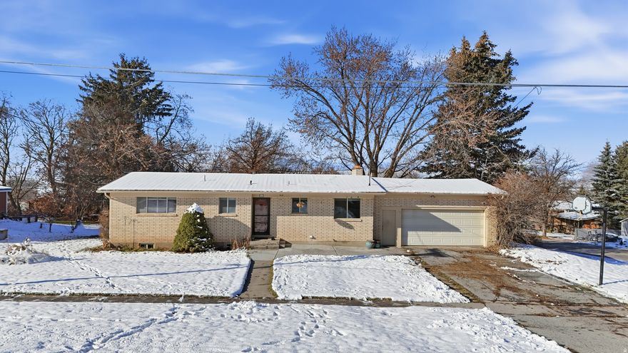 Welcome home to this charming all-brick rambler nestled on a desirable corner lot in beautiful Richmond. With 5 bedrooms, 2 bathrooms, and a spacious walk-out basement. Sitting on .38 acre, this property provides plenty of space for comfortable living, gardening, play areas, and outdoor fun. You'll love the privacy and natural beauty offered by the mature trees scattered throughout the yard. Outdoor living shines here! Your friends and family will enjoy gathering on the double decks, relaxing on the cozy patio, and soaking in the peaceful shade from the mature trees-an ideal setup for barbecues, or quiet evenings under the sky. Step inside to find a warm, inviting floor plan designed for comfort and convenience. Capture stunning mountain views, filling the home with natural light. Located close to schools and other community amenities, this home blends comfort with convenience in one perfect package. Come take a look and fall in love!