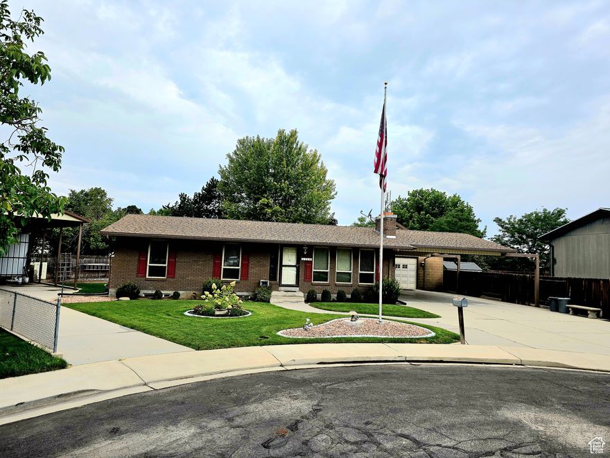 Adorable brick rambler with 2 car garage, 2 car carport, oversized covered RV parking, workshop and new roof. This 4 bedroom (possibly 5) has been lovingly maintained in prestine condition. MUST SEE to undertand the solid build and immaculate care. It boasts beautiful curb appeal and tons of storage. The home is perfect for a family with room to grow. There are 2 fireplaces to warm the hearth and a fully landscaped yard with large garden area. This quiet nighborhood is close to all freeway access, schools and shopping. Home warranty. Priced UNDER appraisal!  OPEN HOUSE SEPT. 13TH 10-1PM