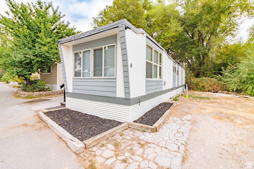 This mobile home just had a complete remodel and is move-in ready! Fresh and bright with new cabinets/countertops, stainless steel kitchen appliances, and new carpet/paint throughout. It offers a bonus room that can be used as a small nursery or office. Quaint, secluded grassy area is perfect for enjoying evenings under the shade of mature trees.  Just a short walk to THREE different parks (Centennial Park, Rotary Park, Greenwood Skate Park), and freeway access is only 3 minutes away. All information is provided as a courtesy only. Buyer/buyer's agent to verify all info.