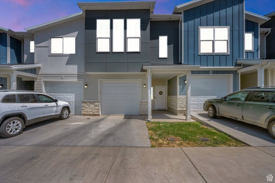 Welcome to this beautifully maintained townhome in the heart of North Ogden! Built in 2019, this 3-bedroom, 2.5-bath home offers stunning mountain views and a bright, open-concept layout perfect for everyday living and entertaining. Beautiful plantation shutters throughout the home not only enhance the aesthetic but also help improve energy efficiency year-round. Located in a quiet, well-kept community just minutes from local schools, shopping, hiking trails, and the North Shore Aquatic Center. Enjoy access to fantastic amenities including a clubhouse, gym, basketball courts, and pickleball courts coming soon. Washer, dryer, microwave, refrigerator, range, and dishwasher are included with the sale. Don't miss this opportunity to own a nearly new home in a prime location. Schedule your private showing today! Buyers and buyer's agents to verify all information provided. Information is provided as a courtesy only.