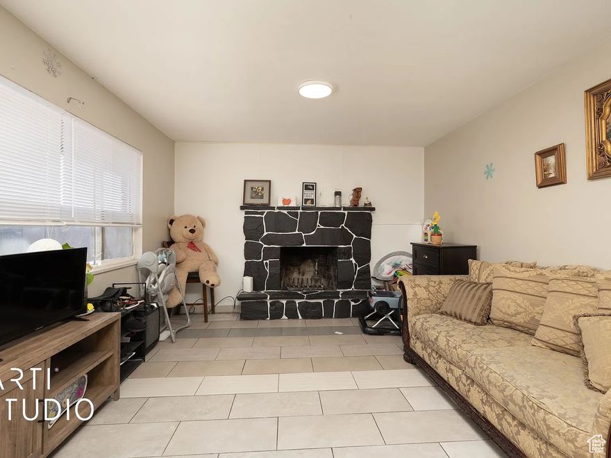 This charming 6-bedroom duplex in the heart of Payson offers both flexibility and strong investment potential. Each unit features 3 bedrooms and 1 bathroom, perfect for generating rental income or accommodating multi-generational living. The upstairs unit showcases unique custom flooring and updated finishes, while the basement unit presents great potential with renovations.  Outside, you'll find mature fruit trees, RV parking, and a spacious driveway. Conveniently located near shopping, dining, parks, and the hospital, this property provides easy access to local amenities. Both units are currently tenant-occupied with leases in place through January.  Please note the home is a non-conforming duplex and does need some work, but it holds significant upside for the right buyer. Whether you're looking to live in one unit and rent out the other or lease both for cash flow, this is a great long-term opportunity. Motivated sellers. Showings by appointment only. Please do not disturb tenants.