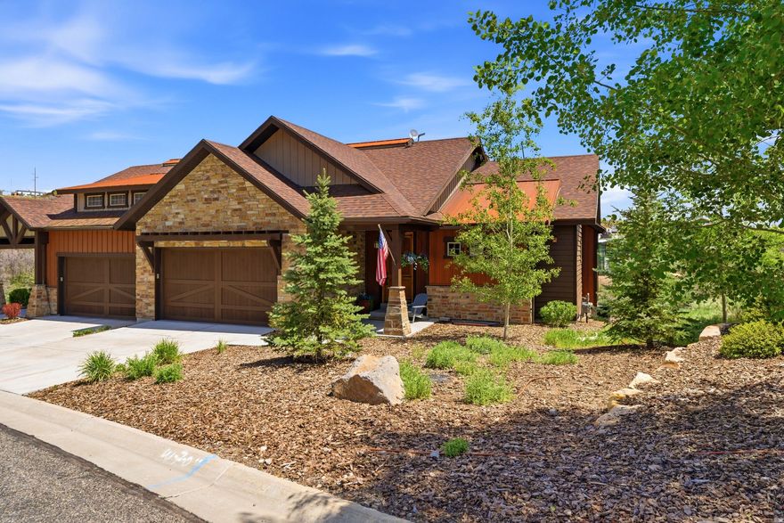 Rustler with serene Canyon views in Hideout This beautifully maintained Rustler Townhome features one of the community's most sought-after downhill floorplans, offering the comfort and convenience of a main-level primary suite. The spacious primary bedroom is complemented by a spa-inspired bathroom with dual vanities, a generous walk-in shower, and an oversized walk-in closet designed to accommodate both full-time living and mountain getaways with ease. The heart of the home is the thoughtfully designed kitchen, featuring quality finishes, ample workspace, and an open layout that flows seamlessly into the dining and living areas. The inviting south-facing living room is filled with natural light and anchored by a cozy fireplace, creating the perfect setting to relax after a day on the slopes or trails. Just beyond, a private deck captures peaceful views overlooking Tuhaye, offering an ideal space for morning coffee, evening sunsets, or entertaining family and friends. The lower level creates a wonderful secondary gathering space, complete with a spacious family room that provides guests or children their own comfortable retreat. Three generously sized bedrooms, offer privacy and flexibility for hosting family and visitors. A bonus home theater adds another layer of enjoyment and is perfectly suited for movie nights, sporting events, gaming, or simply spending quality time together. Designed with functionality and ease of ownership in mind, the home offers abundant storage throughout, including built-in wall storage systems in the garage, an EV charging station, a tankless water heater, and numerous thoughtful upgrades that enhance both comfort and efficiency. As a true four-season basecamp, the location is exceptional. Situated just minutes from both Park City Mountain Resort and Deer Valley Resort, the home offers quick access to world-class skiing, snowboarding, golf, hiking, and mountain biking. Jordanelle Reservoir is nearby for boating, paddle boarding, and lakeside fun!
