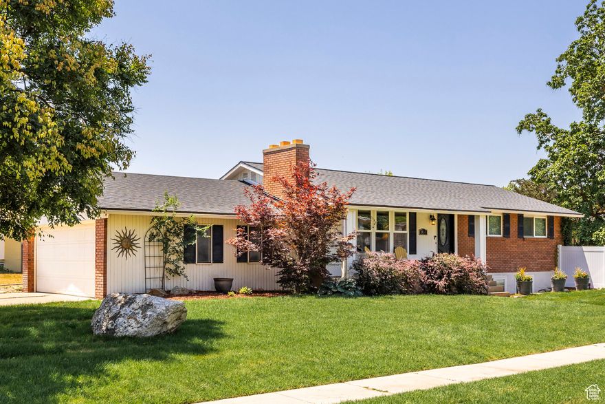 A fresh price creates a new perspective. Take a closer look at all this rambler has to offer. With multiple family gathering spaces, 2 fireplaces and 5 bedrooms that can also accommodate your home office needs, this home should not be missed. Recent renovations and upgrades include luxury vinyl plank flooring throughout, interior paint, new baseboard and door casings, stainless kitchen appliances. A primary bedroom with ensuite bathroom featuring radiant heated floors adds a touch of luxury. 2 additional full size bathrooms have also been renovated. Large windows allow abundant natural light and are fitted with custom blinds. Step out from the kitchen area to a the covered back deck and spacious .30 acre lot with fully fenced yard where you can enjoy outdoor entertaining. Lots of room for play, garden areas, and pets too! The attached double car garage with storage room, additional shed and RV parking area will surely appeal. This location is all about convenience: walk to stores, coffee shop, parks, the elementary school, convenient access to highway routes to Salt Lake City and SLC airport. Sports enthusiasts will enjoy the local bike trails and the convenient drive to world famous ski resorts located close enough to catch those early morning first runs this coming snow season!