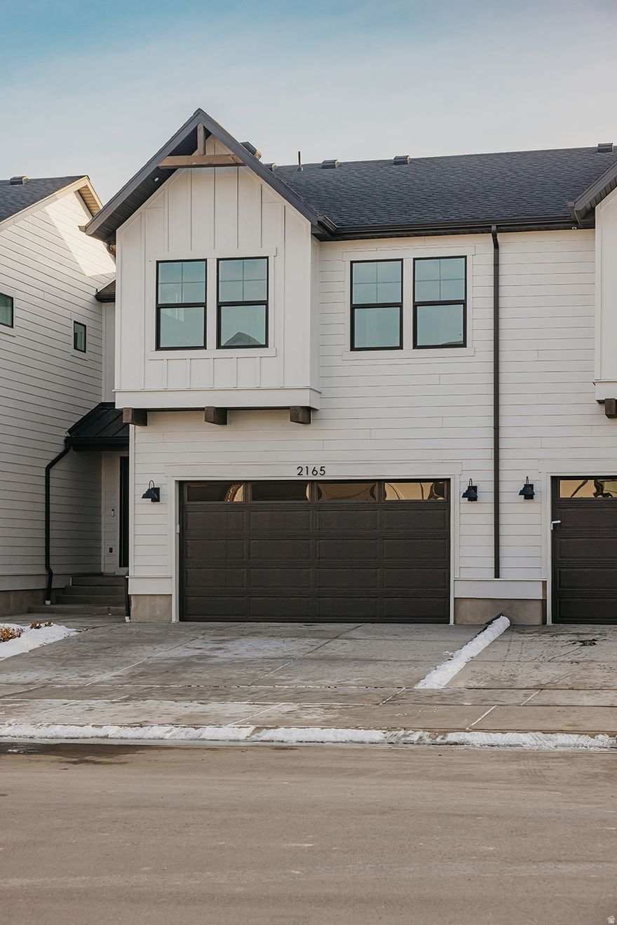 *SPRING CLOSING. The Wasatch townhome features three bedrooms, two bathrooms, two-car garage and a spacious main living area with a tall ceiling in the living room. On the main floor, you will find a living room, semi-formal dining area, and kitchen with peninsula. Toward the back of the townhome there is access to a fenced off back patio space. Upstairs, there are three bedrooms, including the master, which features an attached master bath and closet.   This home is located in Firefly, the master-planned community built specifically for kids to live life unplugged. Stop fighting over screen time and start reconnecting in an environment engineered to encourage play. Firefly isn't just a neighborhood, it's a 350+ acre network of parks, trails, and amenities designed to inspire adventure and activity. The day you move in, your kids will be enjoying the skate and wheels park, the bike pump track, the downhill mountain bike course, pickleball and basketball courts, neighborhood playgrounds, and miles of trails. Is your child shy? Firefly has the region's only full-time Activities Director curating weekly activities and events for all ages, encouraging families and neighbors to connect in nature. Located in Eagle Mountain, Firefly is an easy commute to the Silicon Slopes, with close proximity to shopping and entertainment. Just 40 miles south of Salt Lake City and 30 miles north of Provo, it's one of Utah County's fastest-growing cities. Book a tour of this beautiful Candlelight home, explore all the amenities, and see for yourself why Firefly is the best place in Utah to raise your kids.