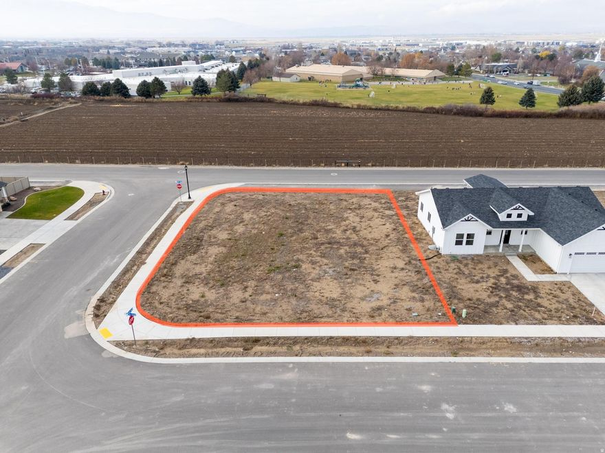 Lot # 1  Smiling H Subdivision is an inviting community located in the charming North Logan, Utah. This beautifully designed neighborhood offers a variety of amenities and features that cater to any lifestyle. Residents can enjoy the nearby recreational activities, include pickle ball courts, a splash pad for fun on warm days, and even an ice rink for winter sports enthusiasts. A public library and a police department nearby enhance the community's convenience and security. Families will appreciate the close proximity to schools, making it easy for children to access quality education. Additionally, every building lot is equipped with secondary water connections which is a big saver for the overall water bill. The availability of high-speed fiber internet provides residents with excellent connectivity for work and leisure. The fiber internet bill is part of the low monthly HOA fee of $65. Overall, Smiling H Subdivision offers a harmonious blend of nearby recreational opportunities and essential services, making it an ideal place to call home.