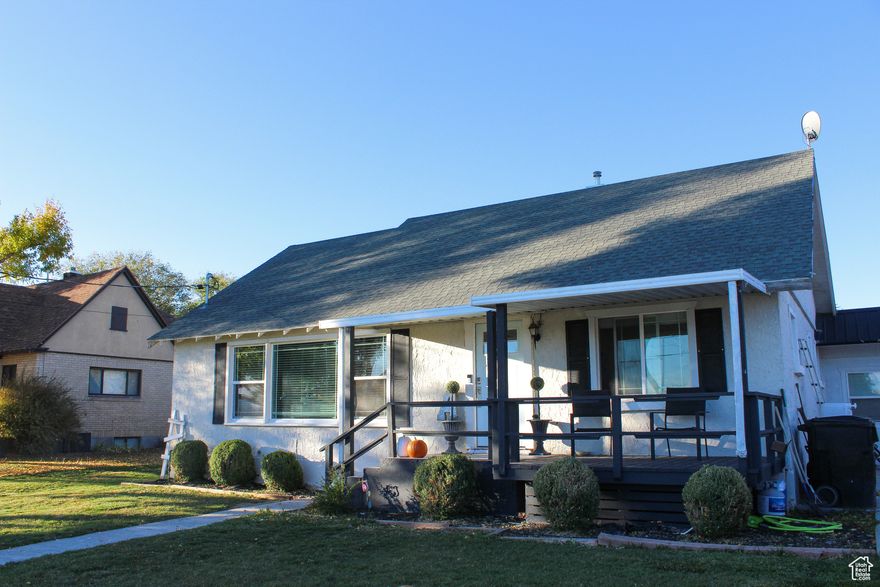 Step into timeless charm with this beautifully updated 4-bedroom, 2-bathroom home, originally built in 1939. Nestled on a spacious .30-acre lot fully fenced back yard with so many possibilities. Drive through gate is wide enough for an RV and proerty is wired to have power in the backyard for RV hook-up. Inside, you'll find thoughtful updates throughout while preserving the home's original warmth and charm. Shiplap, built in cabinets and hardwood floors in several areas of the home. The garage has been convereted into a master suite featuring a walk-in closet and a custom-built tile shower, offering a luxurious retreat. Whether you're drawn to the vintage details or the modern comforts, this home offers the best of both worlds.Buyers agent must be present at all showings.