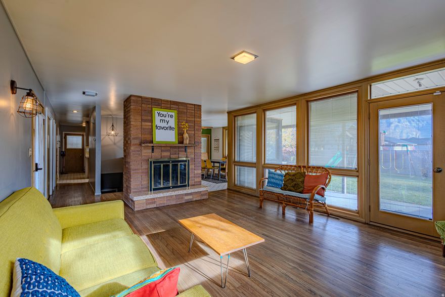 Modern rambler with 2,500 sq ft of stylish living. Features 4 bedrooms, 2 baths, hardwood floors, floor-to-ceiling windows, and abundant natural light. Finished basement adds flexible space. Private yard with RV parking perfect for relaxing or entertaining.