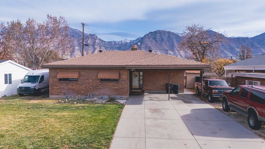 Modern rambler with 2,500 sq ft of stylish living. Features 4 bedrooms, 2 baths, hardwood floors, floor-to-ceiling windows, and abundant natural light. Finished basement adds flexible space. Private yard with RV parking perfect for relaxing or entertaining.