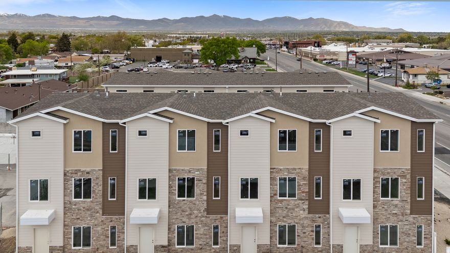 *$5,000 lender credit with preferred lender!* Welcome to a GATED modern townhome community just off Fort Union Blvd in prime Midvale, steps from shopping, dining, freeway access, and public transit. These brand new 3 bed, 2.5 bath homes feature 9 foot ceilings, abundant natural light, and an open concept main level that flows from living area to a standout kitchen with large island, gas range, stainless appliances, and under cabinet lighting. Upstairs, the primary suite offers a walk in closet and curbless shower, with two additional bedrooms and a full bath rounding out the layout. Every home includes an oversized deep load garage, 96% high efficiency furnace, smart thermostat, and radon mitigation system, plus the privacy and security of a GATED community. Multiple units available with a model home to tour. Square footage is a courtesy estimate from builder plans; buyer to verify.