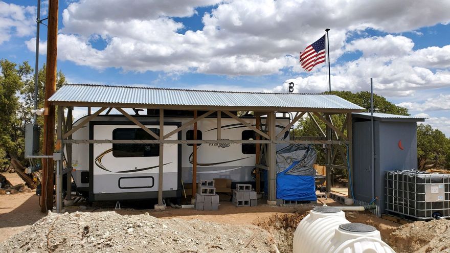 9.5 acres close to Starvation Reservoir. Excellent recreation spot or build your dream home. 220 Amp Power, septic and cistern already installed. Nice covered awning for your RV with covered deck. Includes 40' shipping container for storage, greenhouse, firepit, class C motorhome and outhouse. Come check out the amazing views!