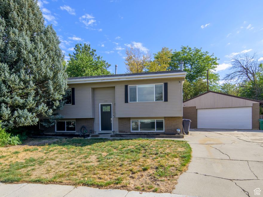 Tucked away on a quiet cul-de-sac, this beautifully updated home has everything you've been looking for - and more! Step inside to find a bright, modern interior with fresh finishes throughout: refinished hardwood floors, new carpet and laminate, stylish LED lighting, and brand-new doors. The kitchen is a showstopper, featuring crisp white and gray cabinetry, striking black granite counters, and stainless steel appliances. Major updates done in the past few years mean peace of mind: a new 30-year roof, new vinyl windows, new HVAC, and a new water heater - all done and ready for you. The oversized garage is a dream, complete with 220v service for your workshop or EV, and a third bay that opens directly into the backyard. Out back, you'll love the fully fenced yard with auto sprinklers, mature shade trees, and even a chicken coop - the perfect mix of comfort and charm. Just two blocks from the TRAX station and only minutes to the freeway, this home blends quiet neighborhood living with unbeatable convenience.