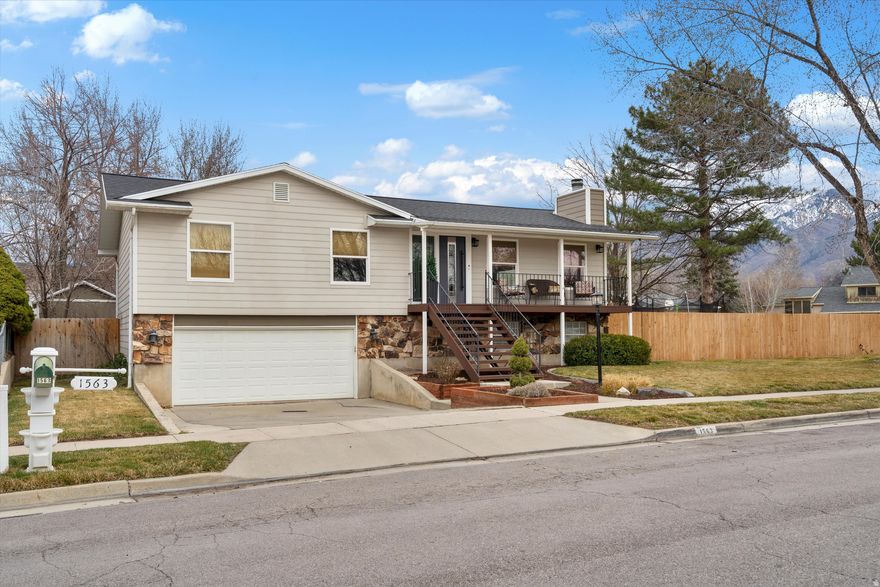 Welcome to this beautifully remodeled split-level home in East Sandy featuring 4 bedrooms, 3 bathrooms, and a dedicated office/flex space. Renovated in 2023, this home offers modern finishes and major system updates for peace of mind - including a new roof and tankless water heater (2021) and a new furnace (2024). The open-concept main level is designed for gathering, with a spacious kitchen island, gas fireplace, and seamless flow for entertaining. The primary suite is a true retreat, complete with a spa-inspired bathroom featuring a freestanding soaking tub, separate shower, double vanities, knee desk, and private toilet closet. Step outside to a fully landscaped backyard built for both relaxation and entertaining. Enjoy the covered patio with outdoor TV mount, a separate firepit area, mature trees that provide incredible summer shade, and a fully fenced cedar privacy fence - all while preserving stunning views of Lone Peak. Two custom-built sheds (2023) add exceptional versatility: a 200 sq ft detached shop and a 96 sq ft storage shed, both paint-matched to the home. This property combines thoughtful updates, functional space, and unbeatable mountain views - all in a prime East Sandy location.