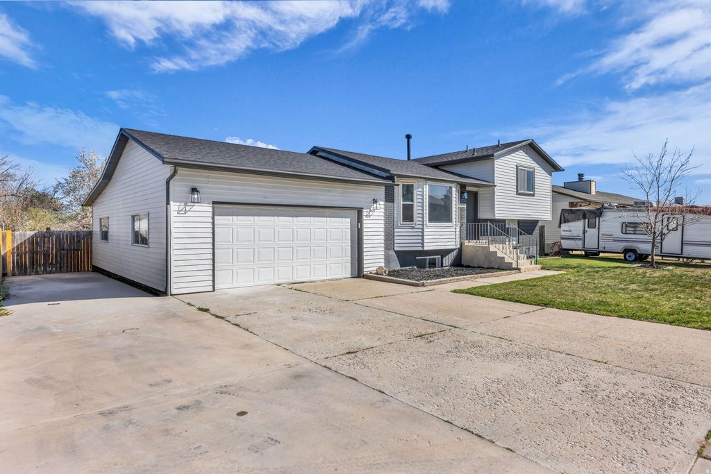 Photo of 7004 W 3980 S, West Valley City, UT 84128 (MLS # 2146212)