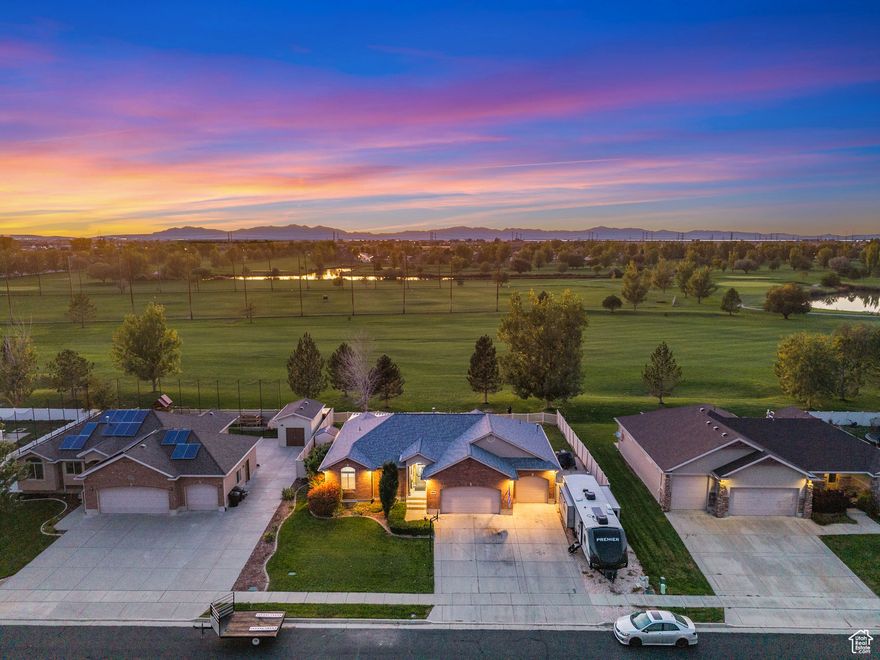 Beautiful rambler located on Remuda Golf Course! This home features an open layout with vaulted ceilings and large windows that bring in natural light and views of the course. The spacious kitchen with a large island is perfect for gatherings. The primary suite offers comfort with a large jetted tub while the unfinished basement provides endless potential for adding more living space as your family grows. Complete with a covered patio overlooking the backyard, along with a vegetable garden and shed. A three-car garage and RV parking provide plenty of space for vehicles and storage. This home offers the perfect combination of comfort, functionality, and golf course living!