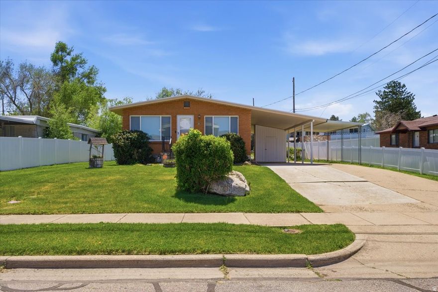 Charming Rambler in Washington Terrace! Very clean 4-bedroom, 2-bath home in an established neighborhood featuring paint and flooring updated approximately one year ago, along with an inviting floor plan. Main level offers 2 bedrooms and a full bath, including an extra-large bedroom with dual closets. Finished basement includes 2 additional bedrooms, a full bath, and extra living space. Cozy cast iron stove adds warmth and charm. Spacious yard with room to relax, garden, or entertain. Convenient location near schools, parks, and amenities.