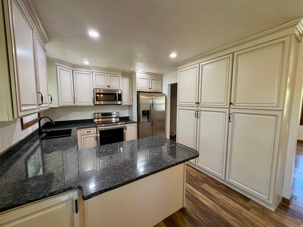 Photo of 2115 N FRUITLAND DR E, North Ogden, UT 84414 (MLS # 2156308)