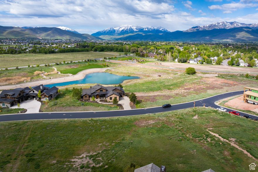 Build your dream home on this affordable homesite in Red Ledges!  Heber Valley's premier four seasons lifestyle community. Slightly elevated to capture majestic views from east to west including sought after Mt Timpanogos. A builder friendly .54 acre lot with a very gradual slope ideal for an uphill build.  Close to the new west gate, Village Center, pools, tennis and pickle ball courts, Wellness Center, and only 12 minutes to the East Village.  Additional  access and close proximity to the walking trails.. Water assessment is paid in full and a Lifestyle Membership is available but not included with this homesite.  A .50% Capital Contribution Fee is required at time of closing by the Buyer.