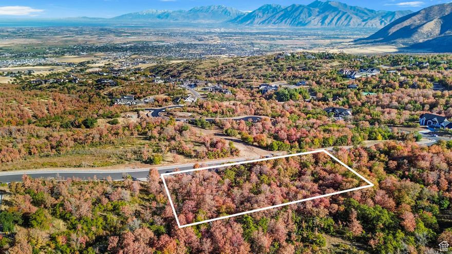 *Check out the virtual tour* RARE opportunity to own 1.43 acres in the exclusive Summit Creek community of Woodland Hills! Welcome to your future sanctuary. These lots offer unparalleled serenity and seclusion, surrounded by lush trees and backing up to a majestic mountain. Enjoy breathtaking valley views from your private haven. Summit Creek boasts miles of biking trails, state-of-the-art pickleball courts, a well-equipped gym, and a brand new pool complex complete with three pools, splash pool, hot tub, locker room and more. This prime piece of land provides the perfect setting for your dream home, combining natural beauty with top-notch amenities. Don't miss this incredible opportunity to own a piece of paradise in Summit Creek. Seller also had home plans fully engineered and ready to go for a 7300 sq ft Dutch/European style farmhouse, custom designed, including a 1,000 sq ft 2 bedroom apartment with full kitchen over the garage (8,300 sq ft total). Or bring your own home design and dream home ideas to be built on this private secluded setting.