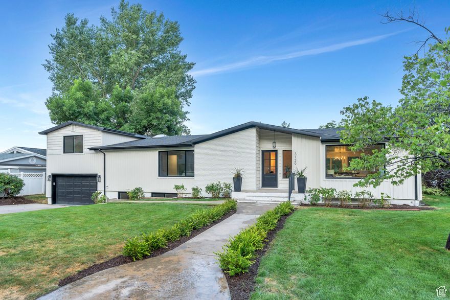*PRICE ADJUSTMENT** SELLER FINANCING* Experience luxury and versatility in this fully remodeled home nestled in the scenic foothills of Provo. Featuring 7 generously sized bedrooms, 3 bathrooms, and two complete kitchens, it's perfectly suited for multigenerational living or rental opportunities. Designed with comfort and flexibility in mind, the home includes dual family rooms, a full mother-in-law suite, and sweeping views of both the mountains and valley. Step out onto the expansive deck, ideal for entertaining or relaxing while overlooking the professionally landscaped backyard. With a flexible layout, stunning outdoor space, and unmatched views, this home offers the perfect balance of style, functionality, and location-a truly rare find.   Square footage figures are provided as a courtesy estimate only and were obtained from county records.  Buyer to verify all.