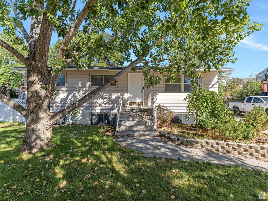 This charming 4-bedroom, 2-bath rambler in central Payson offers ample space to relax and entertain. The home features two large family rooms, a spacious yard with mature trees, and a deck for outdoor enjoyment. With a large lot and plenty of parking, including RV space, you'll have all the room you need.