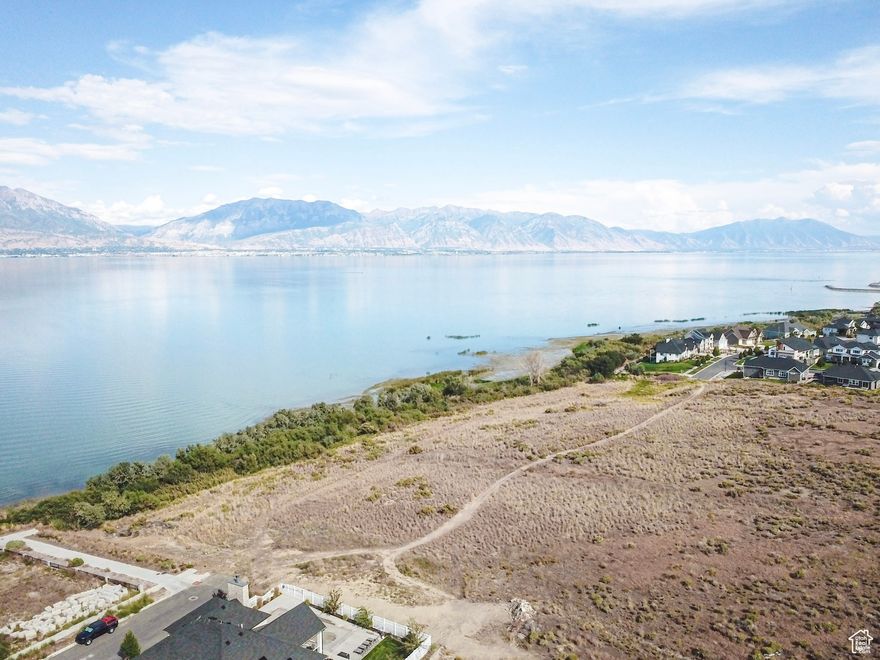Build your dream home in a prime location with stunning lake and mountain views.  This lot is in a beautiful quiet neighborhood and has no HOA.  This lot is available to be purchased as just land, but is also cross listed with the option to build a custom home with Gemstone Development LLC. Buyer and buyer's agent to verify all listing information.  Agent is related to owner.