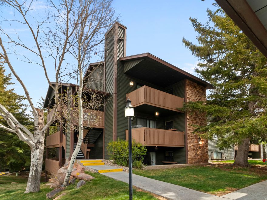 This well-kept 2-bedroom, 1-bath Powderwood condo offers comfortable mountain living with a cozy fireplace, open dining area, private balcony, big primary bed & walk in closet and a convenient basement storage closet perfect for skis, bikes, or outdoor gear, which is just steps from this main floor unit. Enjoy heated tile floors-perfect for winter comfort. Ideally located in the center of the community with equal walking distance to the hot tub, pool, clubhouse, and gym. This unit is right next to walking trails and has access to tennis courts and picnic areas. Located in Kimball Junction, you're just steps from shopping, dining, trails, and public transit, with quick access to I-80. Close proximity to Park City Mountain, Deer Valley, and Utah Olympic Park. Approved for short-term rentals, this property is a great opportunity as an investment or full-time residence all within an easy drive to Main Street, Park City, Salt Lake City and the international airport. Water heater was replaced in 2024 and furnace replaced in 2020. All appliances have been well maintained, including a refrigerator purchased just last October. Schedule to see this beauty today!