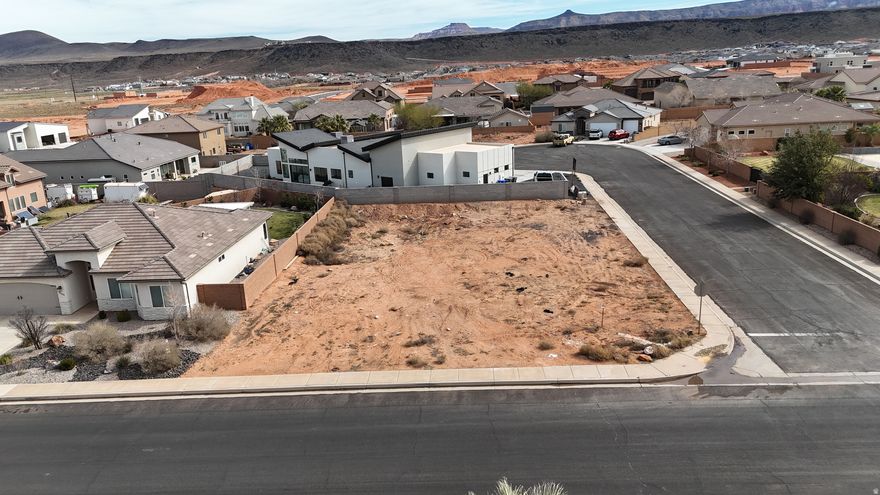 Great opportunity to build in the desirable Dixie Springs community! This building lot at features block walls already in place on two sides, adding value and privacy. Close to Sand Hollow, golf, and endless outdoor recreation. Reach out for more details.