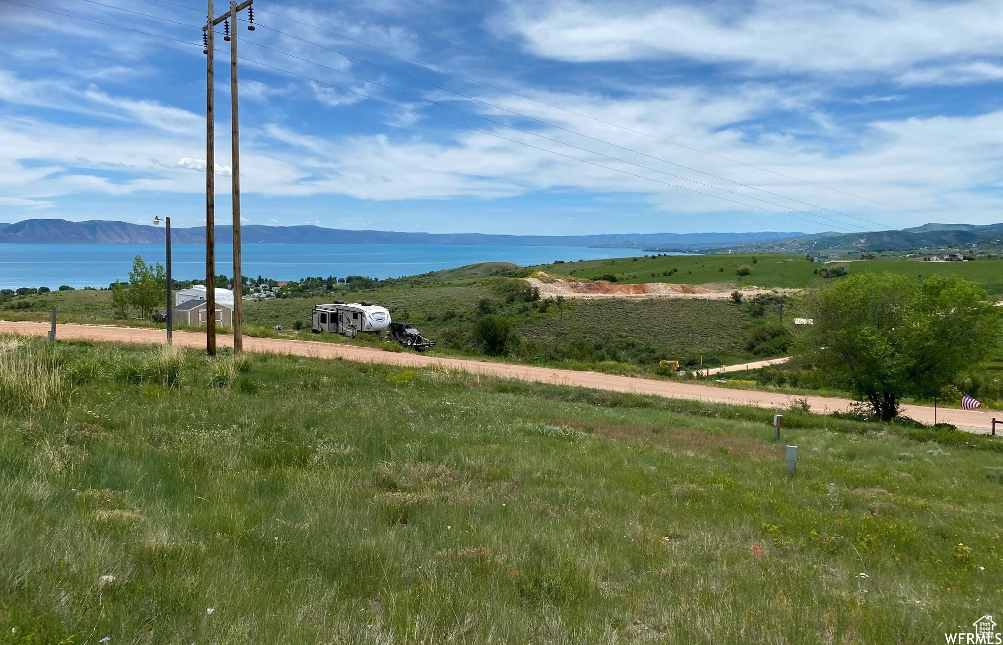 Own your own deeded RV lot in beautiful Bear Lake just north of Fish Haven, Idaho! Enjoy the mountain setting with beautiful view of Bear Lake! Ride directly to Fish Haven Canyon! Close to North Beach State Park. Water is in the road, sewer is a dump station at park entrance. Needs water brought in and lot leveled by the Buyer. POA fee covers all water and power usage, sewer (dump station), Garage, Road & comfort stations maintenance, upkeep and supplies! Come Relax and enjoy your home away from home!