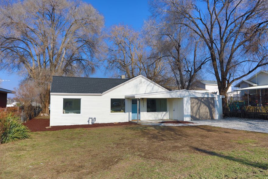 This beautifully reimagined Roy home sits on a large lot and welcomes you with thoughtful, designer selected updates throughout. A brand new roof, new windows, fresh landscaping, and designer exterior paint create standout curb appeal, while inside you'll find a fully renovated kitchen with new cabinetry and quartz countertops, a stylishly updated bathroom with custom tile work, and all new flooring including LVP and plush carpet. Every detail has been refreshed-from new interior and exterior doors to updated base/case, hardware, and lighting-paired with warm, modern interior paint. Major systems are brand new, including the furnace, AC, and water heater, along with the garage door and opener. The result is a move in ready home that feels polished, modern, and effortlessly inviting.