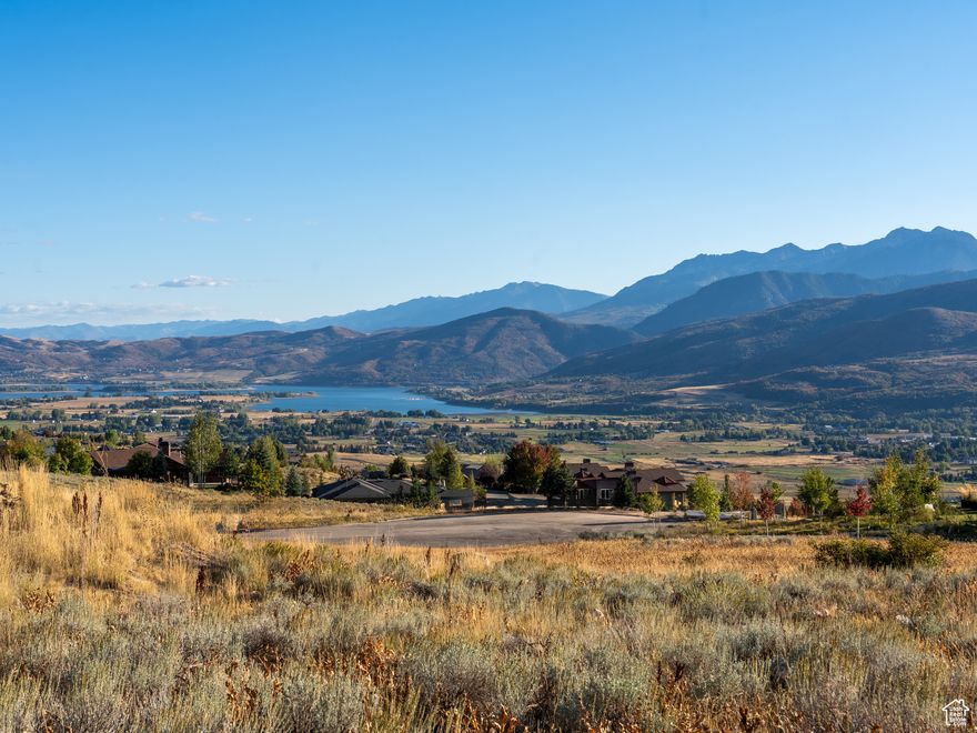 This exceptional southeast-facing homesite showcases sweeping, unobstructed views of Nordic Valley Ski Resort, Pineview Reservoir, and the dramatic peaks that frame Ogden Valley. Backing to preserved common space, the lot offers remarkable privacy and a seamless connection to the surrounding natural landscape-an idyllic canvas for a luxury mountain retreat.  Nestled within the thoughtfully planned Highlands community, the property benefits from strategic building envelopes and protected view corridors, ensuring enduring sightlines and architectural harmony throughout the neighborhood. Every detail is designed to preserve the area's natural beauty while maximizing panoramic vistas.  Just minutes from Powder Mountain, Snowbasin Resort, and Wolf Creek Golf Course, this premier location provides effortless access to world-class skiing, golf, hiking, and year-round outdoor adventure. With development-ready infrastructure, coveted views, and an unparalleled setting, this is a rare opportunity to create your dream home in one of Eden's most desirable communities. Buyer to verify all.