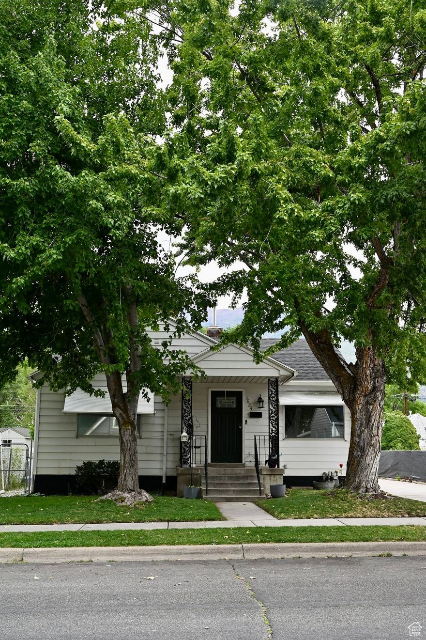 Don't miss out on this home that has so much to offer. With three bedrooms 2 bathrooms, 2 family rooms, a dry bar, and plenty of storage, plus room to grow with the partially unfinished basement.  The fully fenced backyard offers privacy featuring mature trees, a separate fenced in garden and shed. With the pull through garage it allows full access to the back easement alley way plus extra parking for trailers, etc. Come take a look at this home that is just minutes from Weber State university, shopping, hiking, downtown Ogden, and more.
