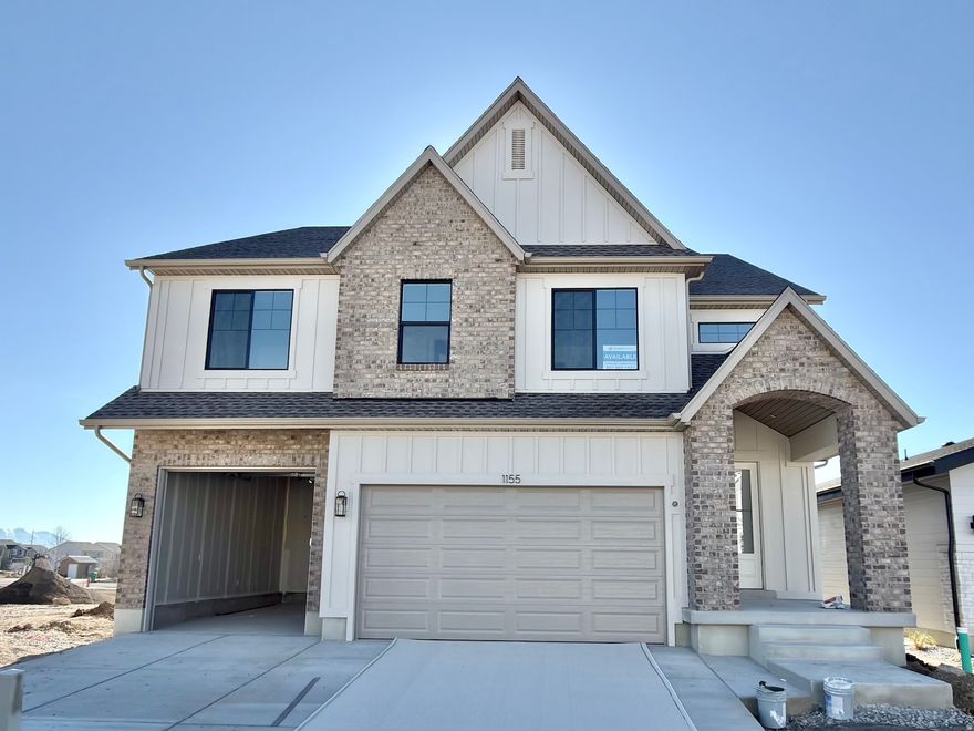 LOT#121 in Lehi Terrace by Symphony Homes. The 'Saltair' plan, estimated completion February 2026. This is a spacious 2-story with designer features throughout. The main floor features a two story great room with a beautiful fireplace. The high end kitchen features double wall ovens and custom vent hood and butler pantry. The dining nook walks out onto the covered deck. The home has a large laundry room and custom built in mud room bench with hooks. Upstairs the primary has a beautiful tray ceiling, it's own seating area, a great sized ensuite bath and the walk in closet has a custom closet butler system.  Bedrooms two and three both have walk in closets and share a jack and jill bathroom. In the fully finished basement, there is one more bedroom and bath, a large game room with full wet bar. Some other great features are the cold cellar, the 9 foot foundation walls, and the active radon system that comes with all Symphony Homes. Don't miss out!