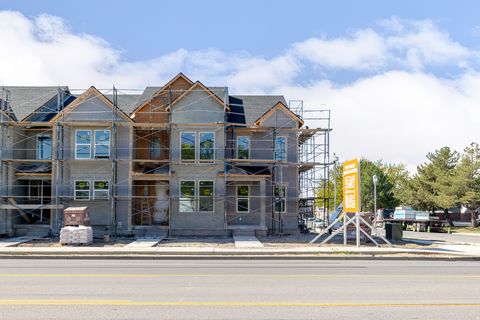Photo of 4066 W FESTIVUS LN #101, Taylorsville, UT 84129 (MLS # 2148834)