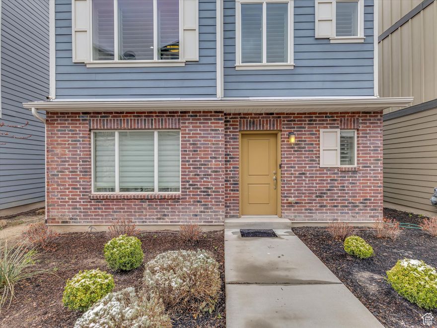 Experience urban living at its finest in this elegant home, featuring high-end finishes throughout. The beautiful kitchen boasts a spacious island and granite countertops, perfect for culinary enthusiasts. The dining area is complemented by a built-in buffet with custom cabinets and quartz countertops, ideal for entertaining.  Custom drapes and plantation shutters enhance the home's aesthetic, while all four bedrooms come with en-suite bathrooms for added privacy and convenience. Upgraded LED lighting brightens each room, creating a warm, welcoming atmosphere. The furnace fan has been upgraded for improved energy efficiency, ensuring comfort year-round.  Enjoy stunning mountain views from the upstairs bedroom, and take advantage of the location within walking distance to Station Park. Experience fine dining, shopping, and easy access to trails, as well as proximity to the new UofU health clinic and IHC hospital. Commuting to Ogden and Salt Lake City is a breeze. Don't miss out on this exceptional home!