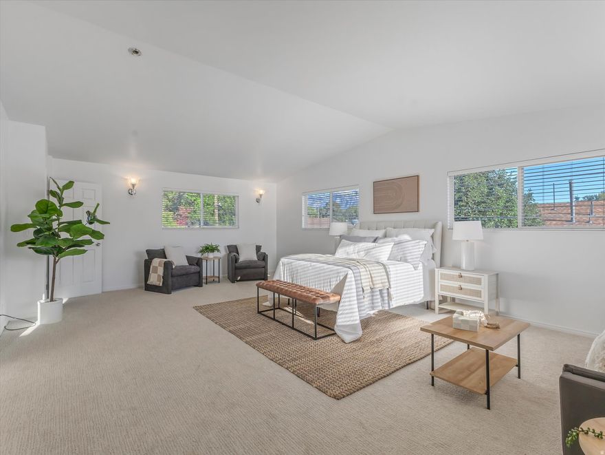 GRAND OPENING Thursday, May 21st from 4:00 PM7:00 PM! This is the home buyers have been waiting for offering the perfect combination of style, space, flexibility, and location. From the moment you walk in, you'll feel the difference with bright open spaces, inviting natural light, and a layout designed for comfortable living and entertaining. One of the standout features is the flexibility this home offers, including a rare main-level primary bedroom option complete with double closets for convenient main-floor living. Upstairs, the true showstopper awaits! An incredible 700 sq ft vaulted retreat featuring a private ensuite bathroom and spacious walk-in closet. This versatile space could also function as a stunning great room, bonus room, theater space, playroom, or potentially be converted into additional bedrooms. The inviting interior showcases beautiful wood-finish flooring, large picture windows, white crown molding, recessed lighting, and thoughtfully designed gathering spaces throughout. The dining area is full of character with exposed wood beams, contemporary chandeliers, a cozy window seat, and an open flow into the kitchen. The kitchen features light wood cabinetry, dark countertops, white tile backsplash, a peninsula island with undermount double sink, and abundant workspace for cooking and entertaining. Need a work-from-home setup? You'll love the dedicated office/den space complete with French doors, exposed beam ceilings, custom built-in cabinetry, under-cabinet lighting, and a built-in workspace designed for productivity and style. The walk-out basement offers amazing potential for a mother-in-law suite, additional entertaining space, or multi-generational living opportunities. Brand new carpet, LVP flooring, and fresh paint throughout make this home completely move-in ready. Outside, this charming ranch-style residence features light-colored siding, a covered front porch with white railing, and incredible curb appeal. The possibilities here are endless, come experience it for yourself!