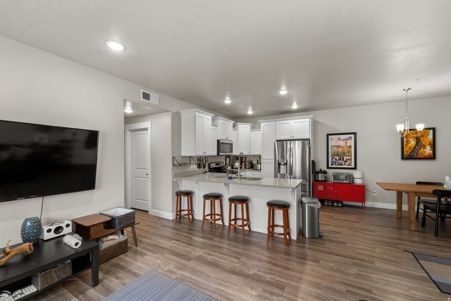 Experience the ultimate mountain living with small-town warmth in this charming second floor 3 bed, 2 bath condo in Heber Valley. Enjoy panoramic views of the Wasatch Back and Mt. Timpanogos. It features modern colors, pristine white cabinets, upgraded quartz countertops, luxury plank flooring, and is in flawless shape. Move-in ready with included fridge, washer, and dryer. Just 10 minutes from Park City, with easy access to skiing at Deer Valley, trails in Wasatch Mountain State Park and Provo Canyon for hiking and biking, plus lakes like Jordanelle and Deer Creek for boating and fishing. Nearby schools, shops, dining, essentials, hospitals, and dental care add convenience. Discover the neighborly vibe, four-season beauty, and wildlife: watch elk and deer, capture sunrises, or stargaze. Community amenities include a clubhouse, playground, and splash pad. An affordable gem for year-round living or getaways. Seller lives here, please schedule 1 day in advance, can move quickly