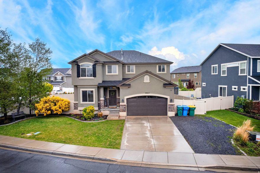 Beautifully upgraded 6-bedroom, 4-bath home nestled in one of Lehi's most desirable neighborhoods. This property features full landscaping with mature trees, offering both privacy and charm. Inside, you'll find spacious, oversized bedrooms and thoughtful upgrades throughout. Enjoy the convenience of washer and dryer hookups on both the second floor and in the fully finished basement. Take in stunning mountain views right from your home, and step outside to access walking and biking trails that wind along the Jordan River. Ideally located near shopping, top-rated schools, parks, and endless outdoor recreation-this home truly has it all.