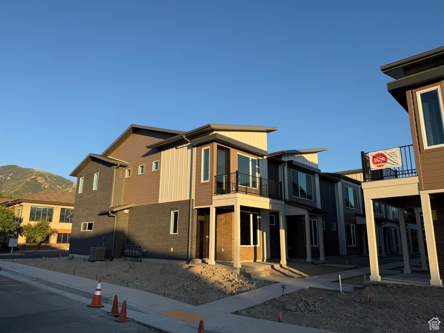 ****SELLER OFFERING $40,000 TOWARD PERMANENT OR ADJUSTABLE RATE BUYDOWNS FOR AN EFFECTIVE PURCHASE PRICE OF $519,900**** Washer, Dryer, Refrigerator, Microwave, Dishwasher and Range included in the sale. Avery Townhomes - 16 brand-new, modern townhomes in Draper, designed with top-of-the-line finishes and clean, contemporary architecture that today's buyers love. These homes feature open, light-filled floor plans, sleek kitchens, and high-quality craftsmanship throughout, making them perfect for owners who want hassle-free living in a thriving area. Located close to parks, trails, shopping, and major commuter routes, these townhomes are positioned in one of Draper's most desirable pockets, making them a smart investment property for your portfolio or a stunning primary residence. With the demand for new, modern homes in Draper on the rise, these townhomes offer a rare opportunity to own in a growing community while maximizing long-term value. Square footage figures are provided as a courtesy estimate only and were obtained from architectural drawings. Buyer is advised to obtain an independent measurement.