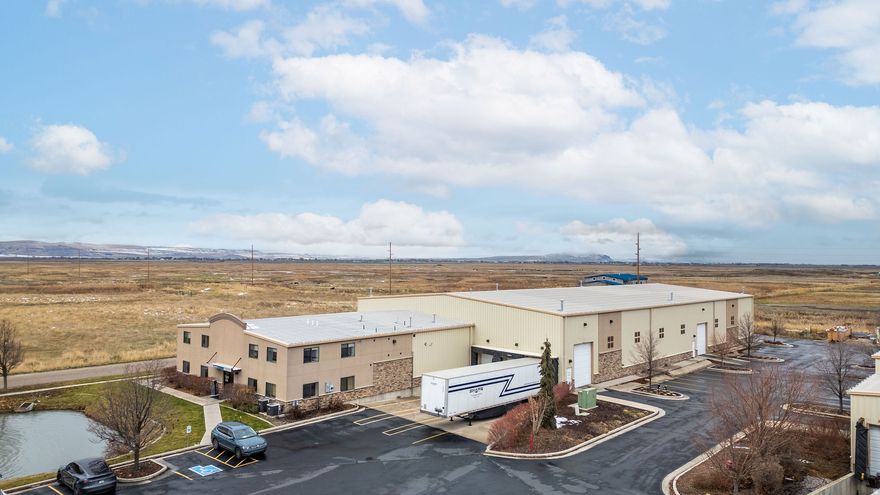 Incredible opportunity for lease in an ideal west Logan location. Blended rate of $.77, which is $1/month for the office space plus $.70 for the warehouse space.  The warehouse has 19,560 sq. ft. with 3 loading docks with large doors plus 2 other oversized  doors.  All equipment and furniture are negotiable. The office space is 6,480 sq. ft.  3,240 sq. ft. on the main level and 3,240 sq. ft. upstairs totaling  8 private offices, a reception area, 4 bathrooms (including a shower), 2 conference rooms, a break room with a full kitchen, large windows with plenty of sunlight and views.  The building to the east is larger and also for lease.  Seller is negotiable on space, call for details or to schedule a showing.  Easy to show. Warehouse - $.70/month or $8.40/year Office - $1/month or $12/year Blended rate of $.77/month or $9.24/year NNN costs are $.08/month or $.96/year